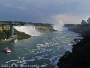 Niagara Falls - the American Falls, Horseshoe Falls, Hornblower Boats, Maid of the Mist Boats, and Observation Tower as seen from the Rainbow Bridge, Niagara Falls, Canada and Niagara Falls State Park, New York.