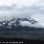 Mt. Hood with its head in the clouds as seen from Owl Point along the Old Vista Ridge Trail, Mount Hood National Forest, Oregon