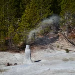 A smoking geothermal stack in the Monument Geyser Basin, Yellowstone National Park, Wyoming