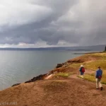 Hiking into the storm on Storm Point, Yellowstone National Park, Wyoming