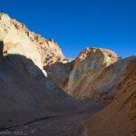 Colorful cliffs and rocks while hiking up Desolation Canyon, Death Valley National Park, California